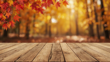 empty wooden table with autumn leaves against blurred fall forest background