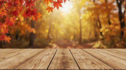 empty wooden table with autumn leaves against blurred fall forest background
