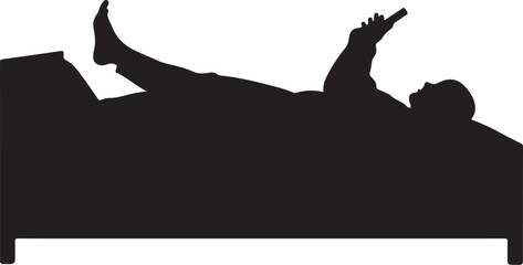 Silhouette of person lying in bed holding remote control