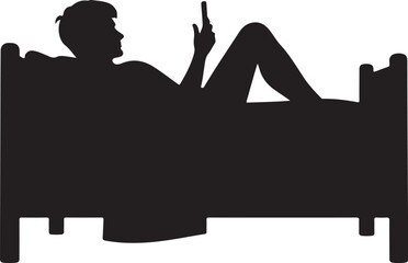 Silhouette of person lying on bed using smartphone