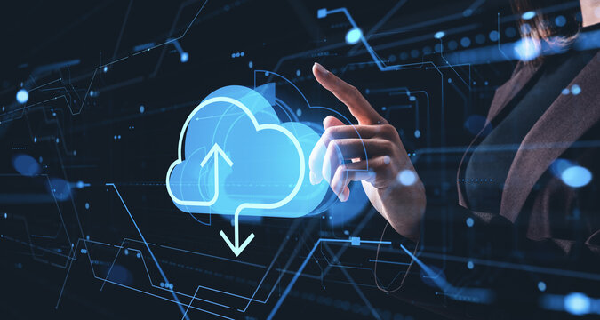 Businesswoman interacting with glowing cloud storage hologram on futuristic digital interface screen in technology concept background for online data access. - Powered by Adobe