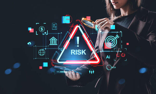 Businesswoman analyzing digital risk concept with holographic warning icons and financial data interface on dark background.