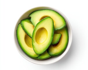 Sliced avocados in a white bowl
