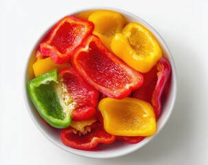 Colorful bell pepper halves in a white bowl