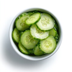 Sliced cucumbers in a small bowl