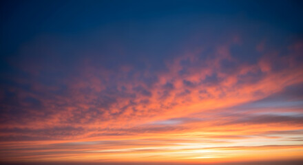 Fototapeta premium Fiery Sunset Clouds with Golden Horizon