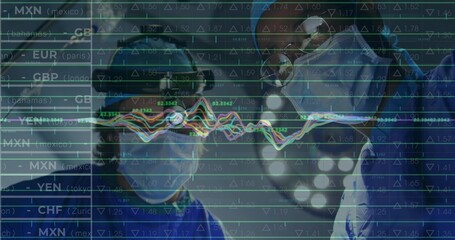 Standing two surgeons wearing scrubs caps goggles masks under lights in OR, with financial overlay
