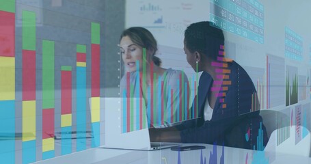 Two businesswomen in blazers studying laptop metrics in modern office, with data overlays