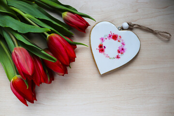greeting card design. bouquet of tulips on a white background and space for text	