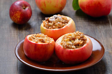 Baked apples stuffed with nut, honey and granola