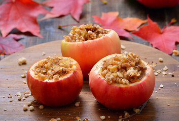 Baked apples stuffed with nut, honey and granola