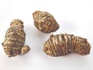 Boiled taro root is ready to be eaten, with a white background. This food contains high carbohydrates and fiber.