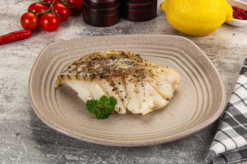Baked cod fish fillet with spices