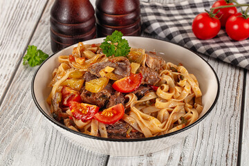 Asian udon noodles with beef