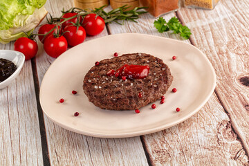 Grilled juicy beef cutlet for burger