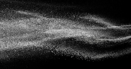 White dust stream in the air. Fine particles suspended in motion on black background. Abstract slow motion texture for concepts of air, dust, purity, or science visuals.