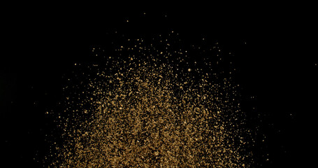 Powerful burst of clay particles exploding upward in a dense cloud, isolated on black. High-speed photography capturing the dynamic texture of dry earth in motion.