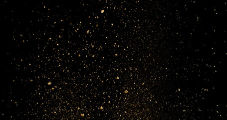 Detailed wave of airborne clay dust swirling in chaotic motion, captured in freeze  motion. Dramatic natural explosion of earthy particles on black background.