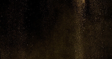 Powerful burst of clay particles exploding upward in a dense cloud, isolated on black. High-speed photography capturing the dynamic texture of dry earth in motion.