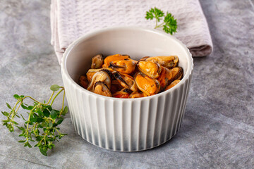 Peeled mussels heap in the bowl