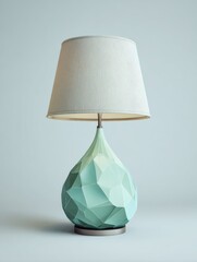 Teal Geometric Lamp with Textured Shade on Light Blue Background