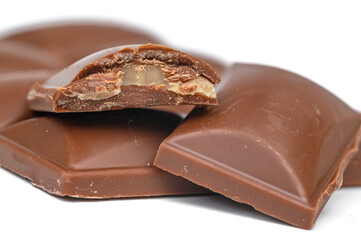 Milk chocolate filled with salted caramel in macro cross-section