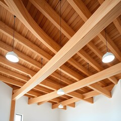 Interior view of a modern building featuring a wooden ceiling with exposed beams and three pendant lights illuminating the space.