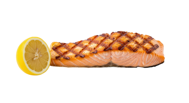 A grilled salmon fillet with a lemon wedge on a white background.