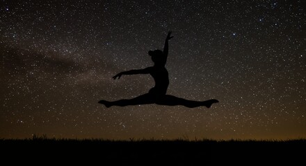 Silhouette of a person performing a split leap against a starry night sky