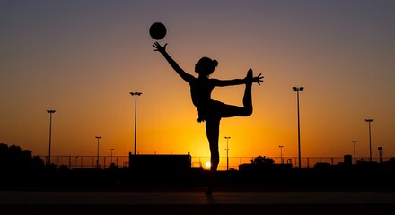 Silhouette of person balancing ball at sunset for wellness concepts