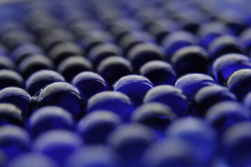Blue ball texture in macro. Diagonal distribution.