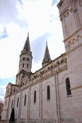 Side view of old church building with gothic style towers