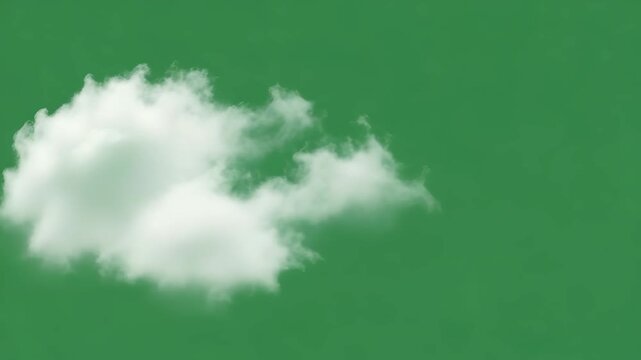 Isolated white cumulus cloud floating against a vibrant green screen background perfect for compositing and visual effects sky