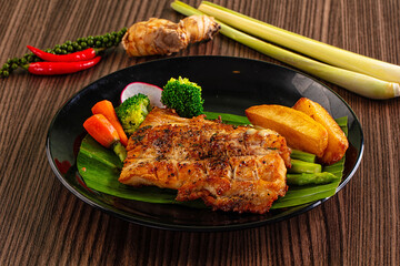 Gourmet asian Grilled crocodile steak