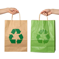 Two hands holding shopping bags. One brown paper, one green plastic. Recycle symbol on both