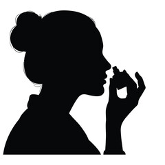 Silhouette of woman spraying perfume on herself with hair in a bun against white background