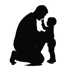 Silhouette of a father kneeling and interacting with his child in a tender moment together