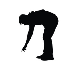 Silhouette of a person bending over with their arm extended towards the ground in a black and white image