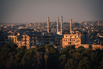 View of a historic Tawheed mosque in Aleppo, captured at golden hour. The elegant destroyed...