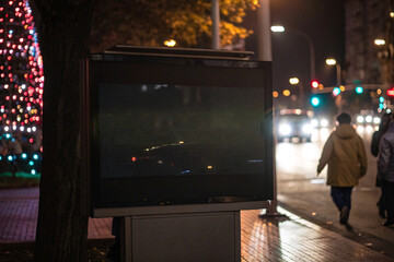 Black digital screen billboard advertisement mockup with Cyber Monday theme at night
