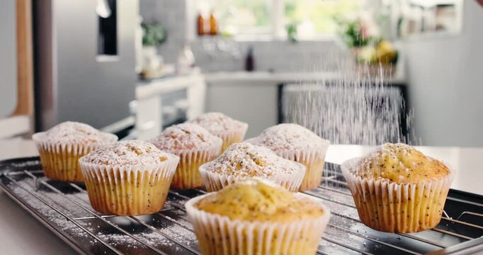 Homemade, muffin or sprinkle with icing sugar in kitchen, baked goods or fresh pastry for tea time snack. Confection, tray of cupcake and cover with powder for taste, sweet treat and dessert meal.