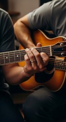 Obraz premium Close-up of Musician Playing Acoustic Guitar with Focused Hand Position.