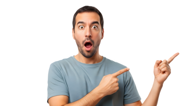 Shocked or surprised young man pointing and presenting marketing idea isolated on white background