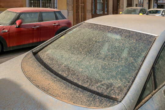 Dust and dirt on a car due to a sand storm from the Sahara desert.
