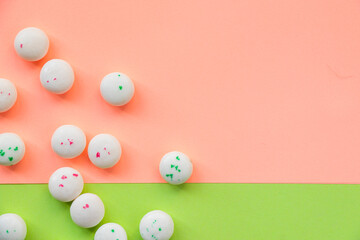 Candy on the pink and green background
