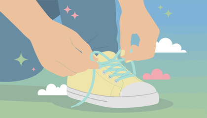 Hands tie shoelaces on a yellow sneaker in a playful outdoor setting Getting ready for adventure