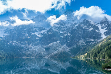 Pristine Reflection of Morskie Oko Lake and Snowy Tatra Peaks, Zakopane, Poland © Marcin
