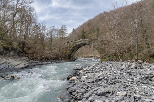 Old stone arch bridge in Ligurian Alps mountains, Mendatica municipality, Imperia province, Italy
