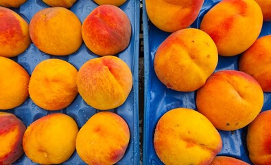 Fresh fruits and vegetables. Photos of ripe peaches.
