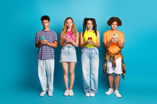 funny creative title without punctuation about four friends teens on blue background using phones in a playful moment